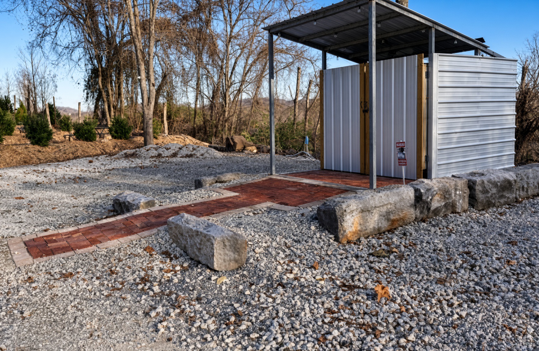 Camp Quarry Trails facilities along a stone path